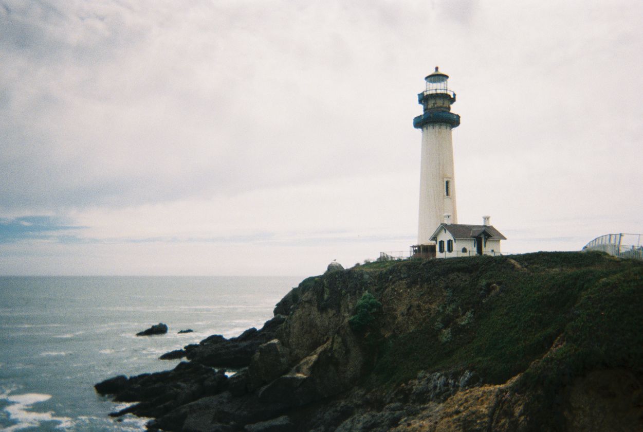 Pigeon Point lighthouse on a rocky cliff